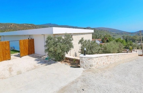 Patara Villa | A stunning contemporary villa with views towards the sea at Patara.