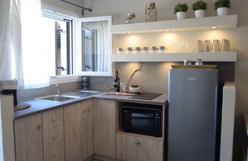 Mirties Apartment | A Suite with fantastic view in the heart of Masouri, yet in a peacefull area