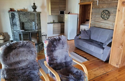 Kesaelahti Villa | A sunny, vintage villa with private sandy beach and breathtaking lake views