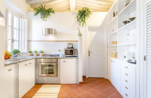 Lucca Historical Center Apartment | A Toproof Penthouse Apartment with Elevator and Private Garden Inside the Walls