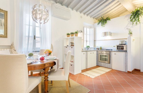Lucca Historical Center Apartment | A Toproof Penthouse Apartment with Elevator and Private Garden Inside the Walls
