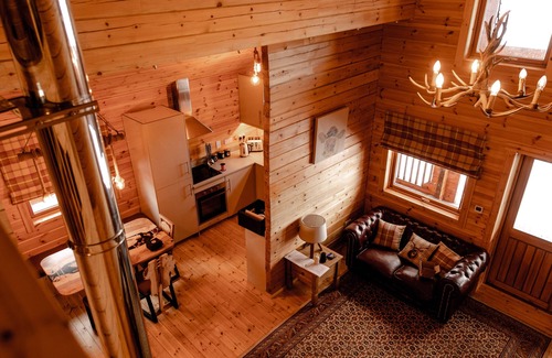 Gorebridge Cabin | A traditional Scandinavian style lodge, with stylish wooden interior decorated with a Scottish theme
