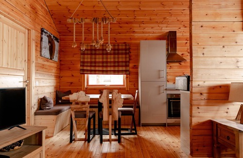 Gorebridge Cabin | A traditional Scandinavian style lodge, with stylish wooden interior decorated with a Scottish theme