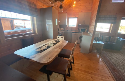 Gorebridge Cabin | A traditional Scandinavian style lodge, with stylish wooden interior decorated with a Scottish theme