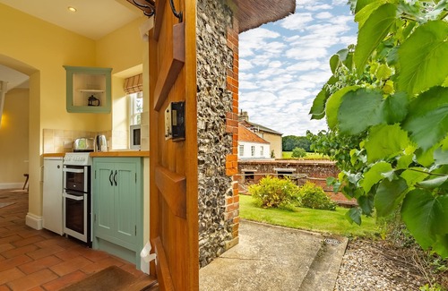 East Tuddenham Apartment | A unique octagonal brick and flint thatched Victorian cottage nestling in a tranquil village locatio