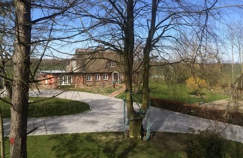 Gelting House | Absolute peace: Detached thatched house with huge garden, pool, sauna .