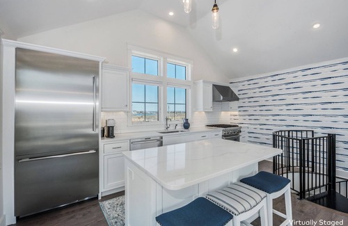 Snug Harbor House | Absolutely stunning! New water front beach house