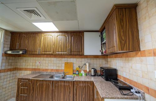 Mussafah House | Abudhabi tourist family Calm Rooms S12 baith al jannah LLC