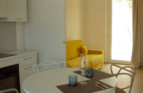 Lido Apartment | Accoglienti Appartamenti Dallo Stile Moderno ed Elegante con Vista Piscina