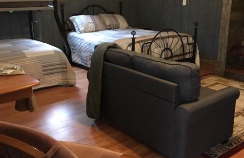 Canton House | Acorn Hideaways Canton Old West Bunkhouse for 9 - Trail's End Corral