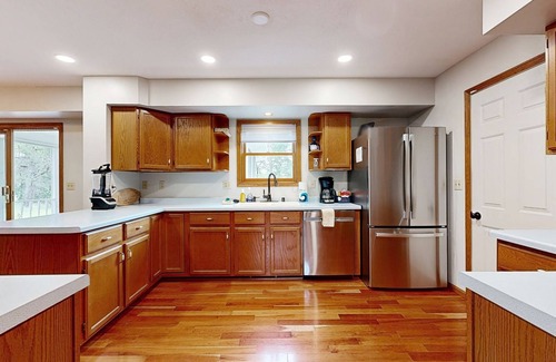 Necedah House | Action-Packed Waterfront Retreat with game room, hot tub, fire pit & more