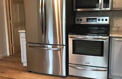 Alexandria Bay House | Adirondack Charm in the 1000 Islands features 3 kitchens.