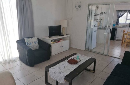 Arniston Cottage | Adorable 2 bedroom apartment with enclosed courtyard and partial sea view