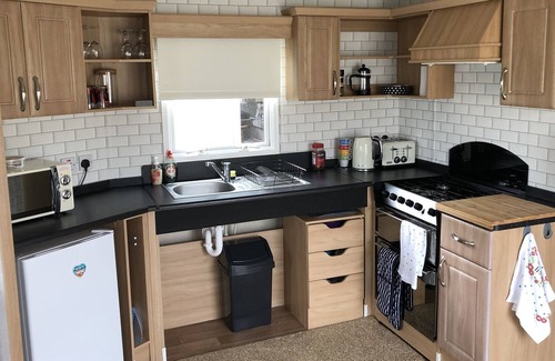 Great Yarmouth House | Adorable 6 berth caravan with decking and disabled ramp in California Cliffs