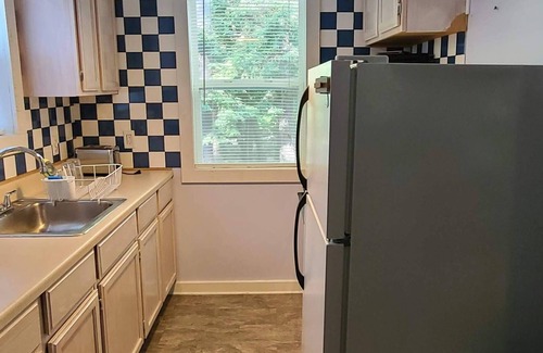 Cheboygan Cottage | Adorable Cottage - Lake Huron Access - Within the tall Northern Michigan trees!