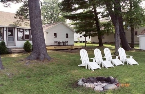 Fife Lake House | Adorable Lake Front Home with 115 Ft of Private Beach.