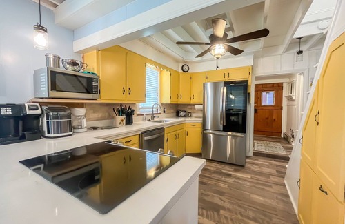 North Glade Hills House | Adorable Lakefront Cottage with Hot Tub and Dock! Pet friendly