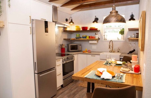 Loveland House | Adorable studio-style cottage with fireplace