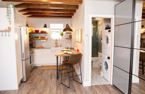 Loveland House | Adorable studio-style cottage with fireplace