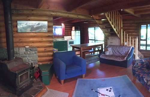 Mt Lyford Cabin | Adorable warm log cabin on a private section ideal for a couple or small family