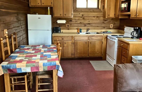Lansing Cabin | Adventurer's Lodge, a charming 3-bedroom cabin with WiFi in quiet Lansing, WV.