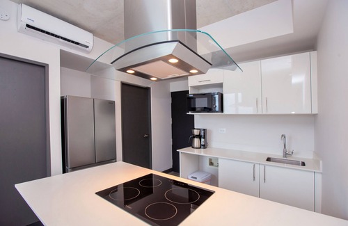 Mata Redonda House | Aesthetic, centric building with multiple amenities and activities.