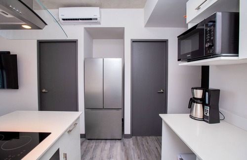 Mata Redonda House | Aesthetic, centric building with multiple amenities and activities.