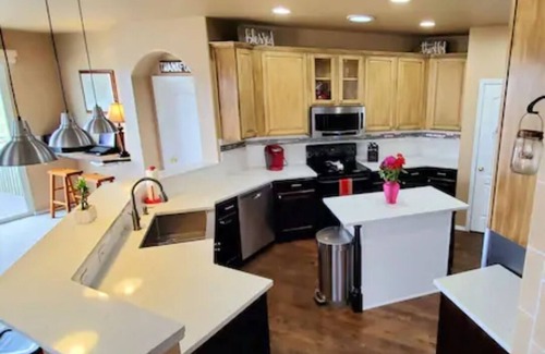 Briargate House | AF Academy Rancher - with walkout and fenced in play area for kids.