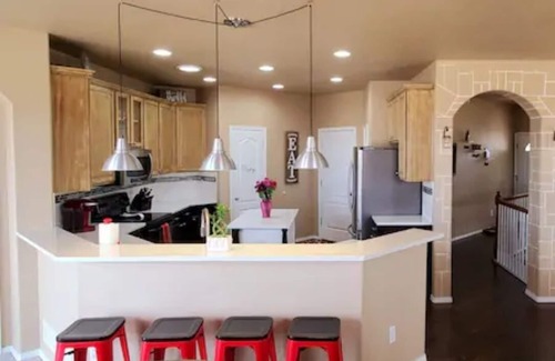 Briargate House | AF Academy Rancher - with walkout and fenced in play area for kids.