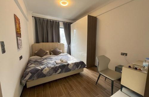 Kigali House | Affordable Luxury Rooms with Pool, Gym and Office Space
