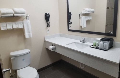 Bay City Hotel | Affordable Room w/Complimentary Breakfast, Microwave, and Full-Size Fridge
