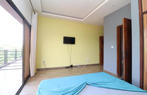 Kribi Apartment | AfriqPnB Chambre Ewondo avec Piscine