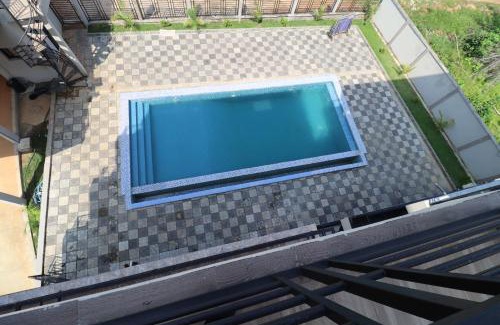 Kribi Apartment | AfriqPnB RF2 Chambre Mvog Ekoussou avec Piscine