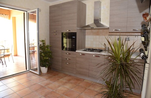 Lido Condo | AFRODITE-Elegant villa overlooking pool.
