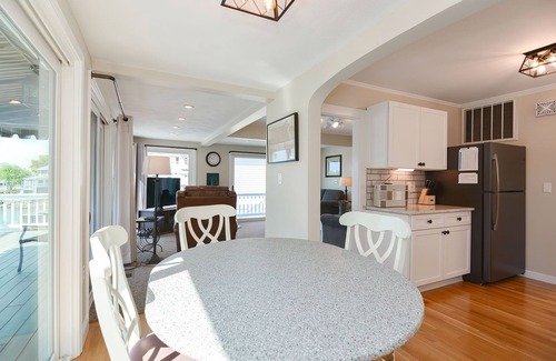 Beverly House | Afternoon Delight: Toast the beauty of the river from the waterfront deck