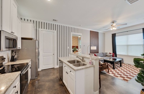 College Park House | Aggieland Gameday Guesthouse with putting green and fire pit! Walk to Kyle Field