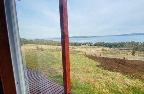 Quellon House | Agradable cabaña, con vista al mar y cordillera