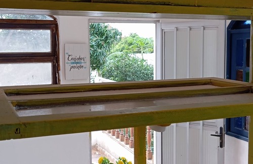 Portinho House | Airy house surrounded by greenery and fruit trees.