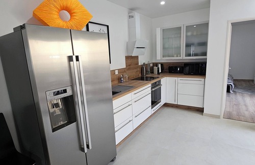 Nemours House | Air-conditioned house in the center of town on a quiet street close to all amenities.