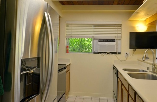 Princeville Condo | Air Conditioned Upstairs Condo with full kitchen, pool, wifi, walk to beach.