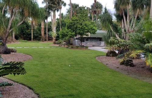 Palmetto Bay Apartment | Airstream pool house, heated pool, lavish gardens, waterfalls, very private.