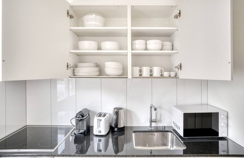 Altstetten Apartment | Airy Altstetten 1.5 Room w/Storage & W/D, nr Local Market, by Blueground