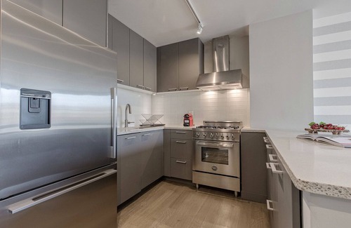 Ukrainian Village Apartment | Airy East Village 1BR w/Doorman, Gym, near NYU, by Blueground
