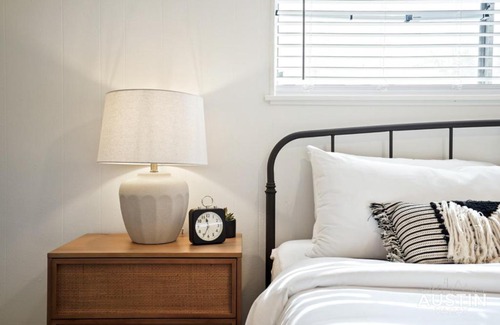 Hancock Apartment | Airy King Bedroom and Comfortable Living Space by UT