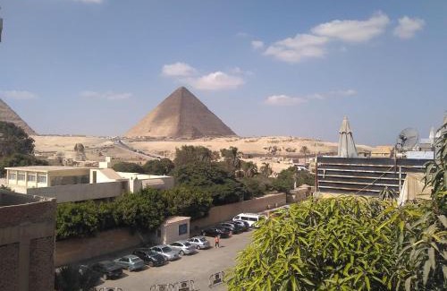 Al Haram House | AL NABELLA SCARAB pyramids view