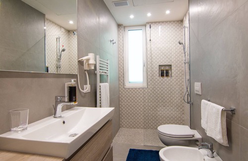 Cagnona House | Albana suite in a brand new private building close to the sea and the center.