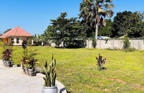 Northern Region Cottage | Alberto Gardens - Two bedroom cottage in secure, private grounds & free parking