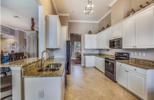 River Hall Condo | All inclusive golf resort in a 3bed 2bath turnkey condo with a lake view!