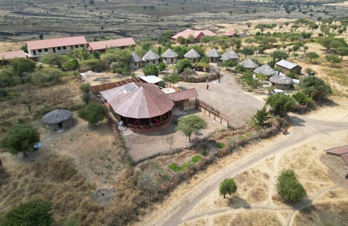 Arusha Region Cabin | All inclusive Maasai hut experience with modern facilities