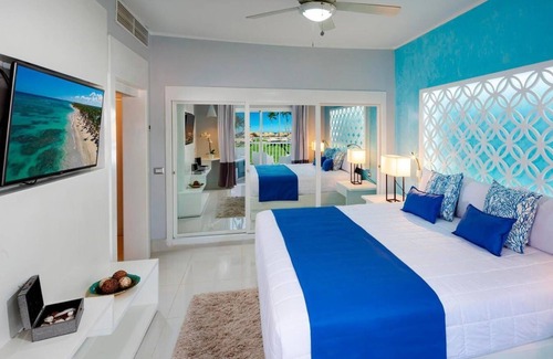 Punta Cana Village House | All inclusive mini suite, jetted tub and balcony at Grand Sirenis in Punta Cana